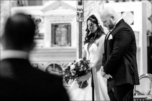bride and groom praying